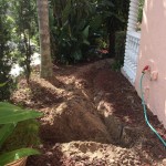 Trenching in difficult lava rock.