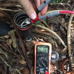 Testing spot light fixture for voltage.